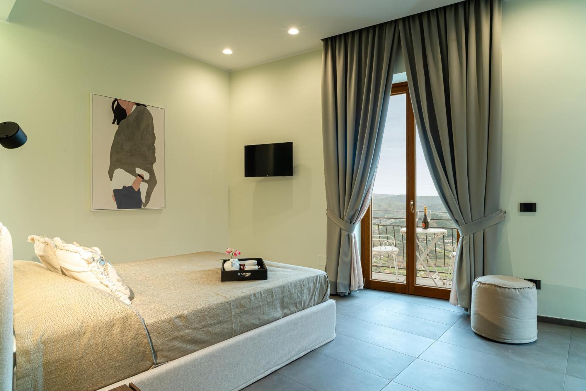 De Gulia Charme And Relax Bed & Breakfast กัสเตลลาบาเต ห้อง รูปภาพ